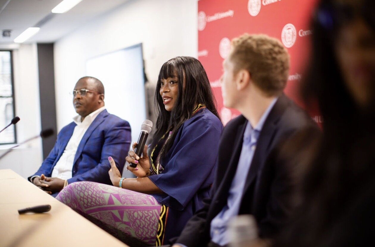 Francine Mbvoumbo speaking on a panel discussion